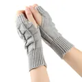 Detailed close-up of grey cable-knit fingerless gloves for women, soft winter accessory. - One Size / Light Gray