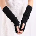 Close-up of black long knit arm sleeves with thumb holes and ruffle edge trim - One Size / Lotus Leaf Style / Black