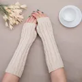 Long cream cable knit fingerless arm warmers for winter warmth - One Size / Light Beige