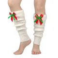 Detail view of white knitted leg warmers with faux fur trim and festive red green bows - One Size / White