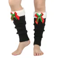 Detail of Christmas leg warmers with plush cuffs and festive red-green bow ties - One Size / Black