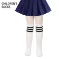 Classic white children's knee-high socks featuring a stylish black three-stripe top design. - One Size (7-12 Years) / White with Black Stripes