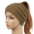 Brown ribbed knitted wide headband for women shown on a mannequin with a ponytail. - Khaki