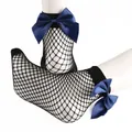 Women's stylish black fishnet ankle socks featuring large elegant navy blue satin bows - One Size / Blue