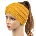 Wide yellow knitted headband for women, winter ear warmer with ponytail hole design - Turmeric
