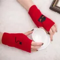 Detailed view of red knitted fingerless gloves with black demon embroidery motif - Devil Pattern Fingerless Gloves (ST19 Devil Tail) / Red