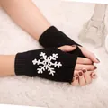 Warm black knitted fingerless gloves featuring a white embroidered snowflake pattern design - One Size / Black