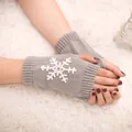 Cozy grey knitted fingerless winter gloves featuring a white embroidered snowflake pattern - One Size / Light Gray