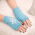 Light blue knitted fingerless gloves with white snowflake embroidery for winter warmth - One Size / Light Blue