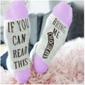 Funny white cotton crew socks featuring purple heels and Bring Me Chocolate sole text - One Size / Purple