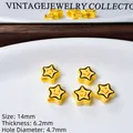 Dettaglio di perline a forma di stella gialla sorridente per accessori gioielli fai da te - Sold Individually / Giallo