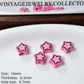 Dettaglio perline rosa a stella con smiley per gioielli fai da te con dimensioni - Sold Individually / Rosa
