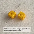 Macro view of 10mm yellow cheese shaped acrylic square beads with straight holes for DIY crafts. - Small Size (Cheese Shape) / 10mm (approx 2mm hole) / Yellow