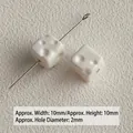 Close-up of small white acrylic cheese-shaped cube beads for DIY crafts - Small Size (Cheese Shape) / 10mm (approx 2mm hole) / White