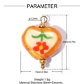 Close-up detail of a heart-shaped ceramic pendant with floral pattern and dimensions - Red Flower Green Leaf Style (YK778)