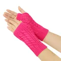 Close-up of bright pink cable knit fingerless gloves with hollowed-out patterns - One Size / Rose Red