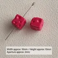 Detailed view of 10mm pink acrylic cheese cube beads with 2mm straight hole for DIY jewelry - Rose Red