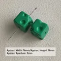 Close-up of green acrylic cheese cube beads showing 14mm size and 2mm hole - Dark Green