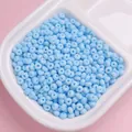 Macrodetail van 4 mm mat lichtblauwe glaskraaltjes voor het zelf maken van sieraden - 200 Stuks / 14 (ai-Sky Blue)