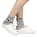 Detail view of grey knitted owl leg warmers with decorative eye buttons and cable patterns - One Size / Light Gray