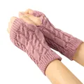 Close-up of pink cable knit fingerless gloves for women, warm winter arm warmers - One Size / Mauve