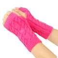 Detailed view of bright pink cable-knit fingerless gloves showing the textured weave pattern - One Size / Fluorescent Rose Red