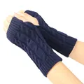 Detailed macro view of navy blue cable knit fingerless gloves with soft winter warm texture - One Size / Blue