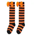 Detailed view of Halloween striped over-the-knee socks with orange satin bows - Kids (7-12 Years) / Orange Black Striped/Orange Bow
