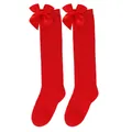 Detail of red knee-high socks for girls with satin bows for Christmas and holiday outfits. - Kids (7-12 Years) / Solid Red with Red Bow