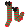 Detailed macro view of girls' red and green striped knee-high socks with black satin bows - Kids (7-12 Years) / Red Green Striped / Black Bow