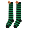Detailed view of Halloween green and black striped knee-high socks with pumpkin dolls - Kids (7-12 Years) / Pumpkin Doll Style / Green Black Stripes
