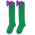 Green knee-high socks for girls featuring large purple satin bows for Halloween party - Kids (7-12 Years) / Solid Green/Purple Bow