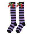 Detailed view of girls purple and black striped knee high socks with red green bowknots - Kids (7-12 Years) / Double Layer Bow / Purple and Black Stripes