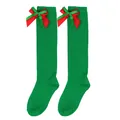 Detail of festive green girl's over-the-knee socks with red and green bows. - Kids (7-12 Years) / Double Layer Bow / Green