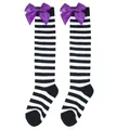 Girl's Halloween striped over-the-knee socks with large purple satin bow decorations - Kids (7-12 Years) / Black White Thin Striped/Purple Bow
