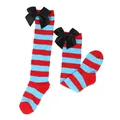 Detail view of red and blue striped girl's knee-high socks with decorative black bows - Kids (7-12 Years) / Blue Red Striped / Black Bow