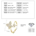Detail eines funkelnden Schmetterlings-Rings mit Zirkonia-Akzenten - Größe 5 / Gold