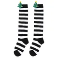 Detail view of children's black and white striped Christmas socks with plush tree - 7-12 Years Old / Wide Black White Striped (Christmas Tree)