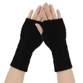 Close-up detail of black knitted fingerless gloves showing the classic cable knit texture. - One Size / Black