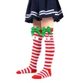 Close-up view of children's Christmas knee-high socks featuring green bows and white pom-poms - Children (7-12 Years) / Red and White Thin Stripes with Green Pom-pom (20#)