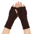Detailed view of brown knitted fingerless gloves worn on hands for winter warmth. - One Size / Coffee