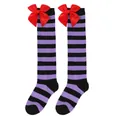 Detailed view of knee-high purple and black striped children's socks with large red bows - Kids (7-12 Years) / Purple and Black Stripes with Red Bow