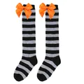 Detail of children's Halloween striped over-the-knee socks with large orange satin bow. - Kids (7-12 Years) / Gray Black Striped/Orange Bow