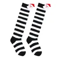 Detail view of striped children's Christmas socks with 3D plush Santa Claus decor - 7-12 Years Old / Wide Black White Striped Santa Style