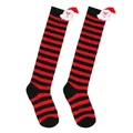 Close-up of children's Christmas knee-high socks with 3D plush Santa Claus decor - 7-12 Years Old / Thin Red Black Striped Santa Style