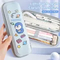 Light blue cartoon penguin pencil case with 3D embossed space theme for kids - Light Blue Penguin Space Capsule