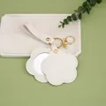 Elegant flower-shaped PU leather compact mirror keychain and bag accessory in cream white - White