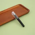 Portable mini black ink gel pen with a compact pocket-sized design for school and office. - 0.5mm / Black