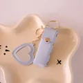 Light blue leather lipstick pouch with heart mirror keychain - Blue