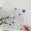 Transparent PVC sticker sheet with blue cartoon emoji face designs for DIY journals. - Cute Smiley Face